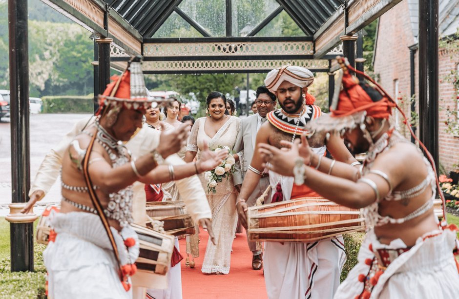 Sri Lankan drummers walking the bride into her poruwa in Manchester